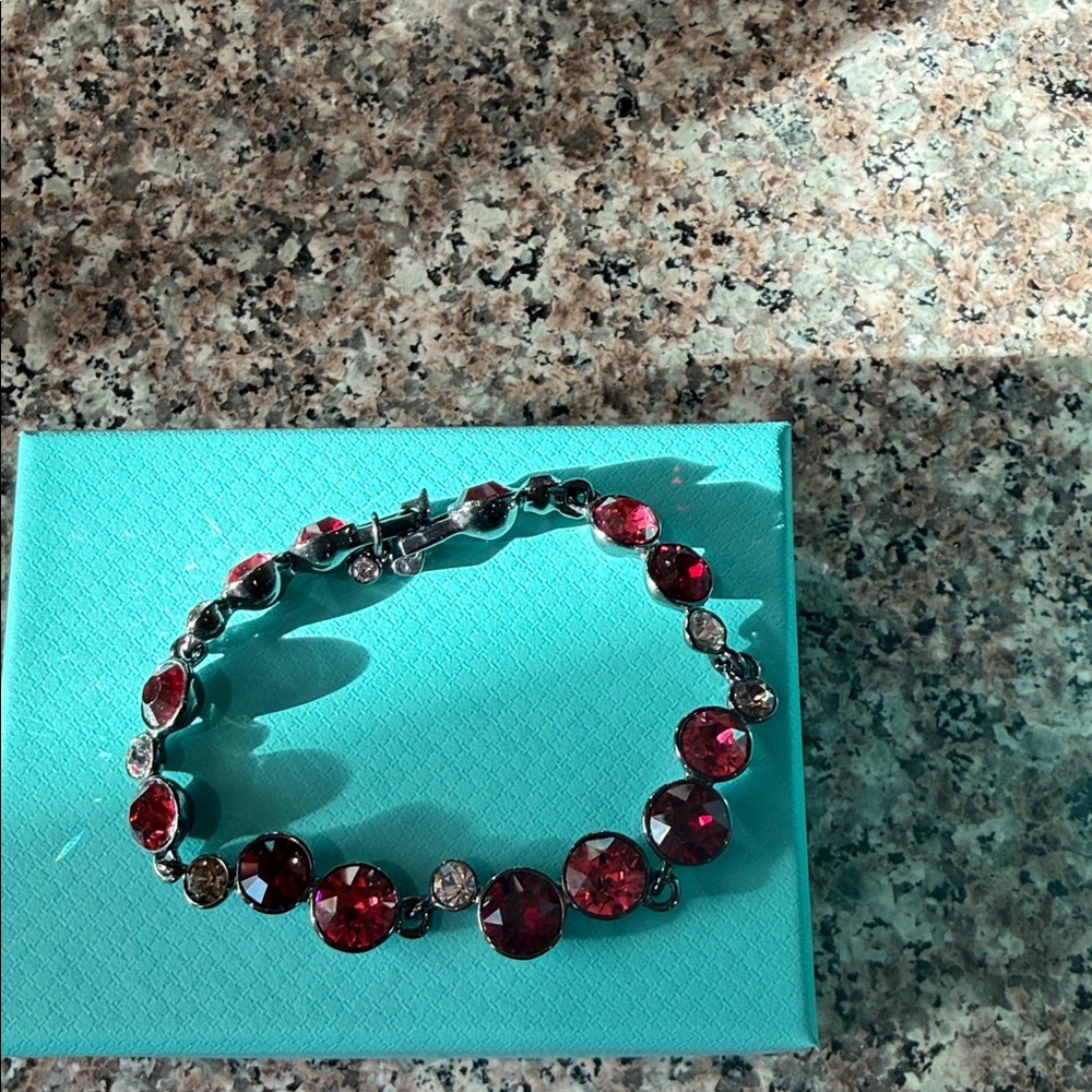 Gorgeous Givenchy diamond red bracelet